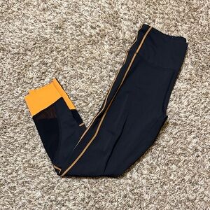 ZYIA NFL Pocket Leggings in Black and Orange
